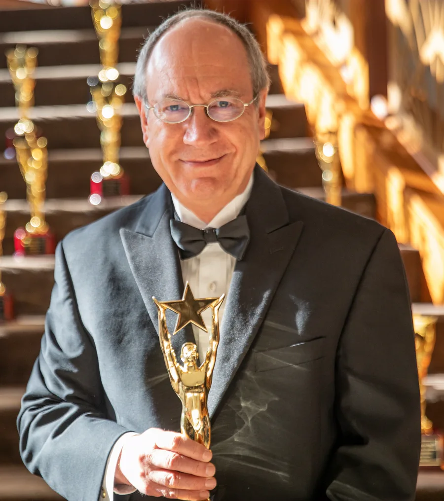 John Fehling holding a Hanley award