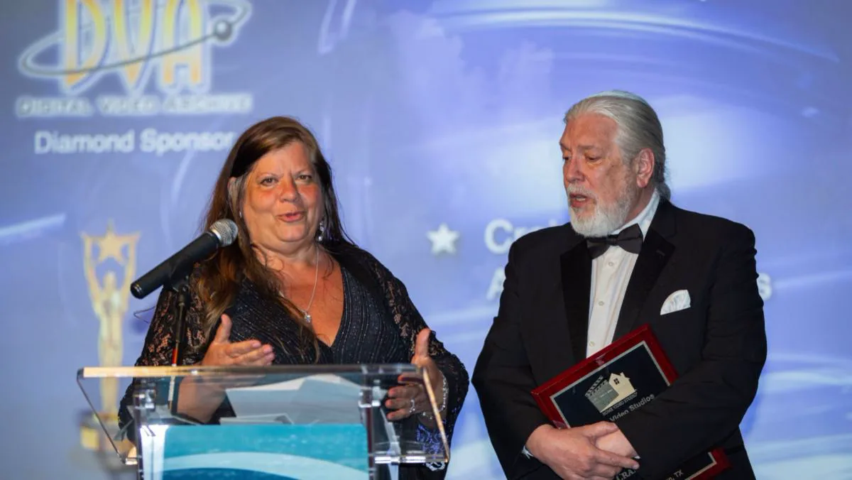 Mary and Craig Peterson accepting an award